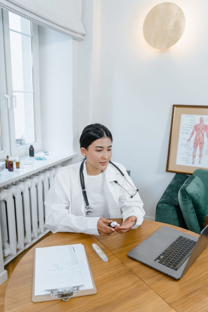 Doctor Seating in Her seat Having A Digital Video Conference